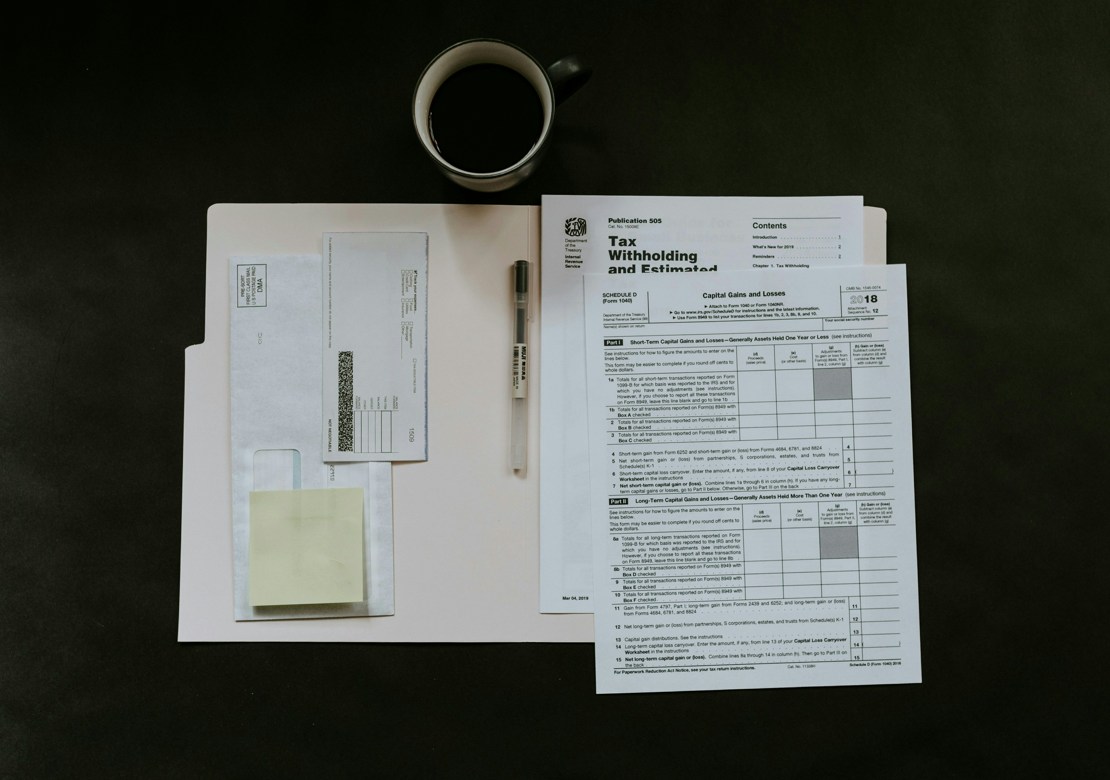 Tax documents laid out on table