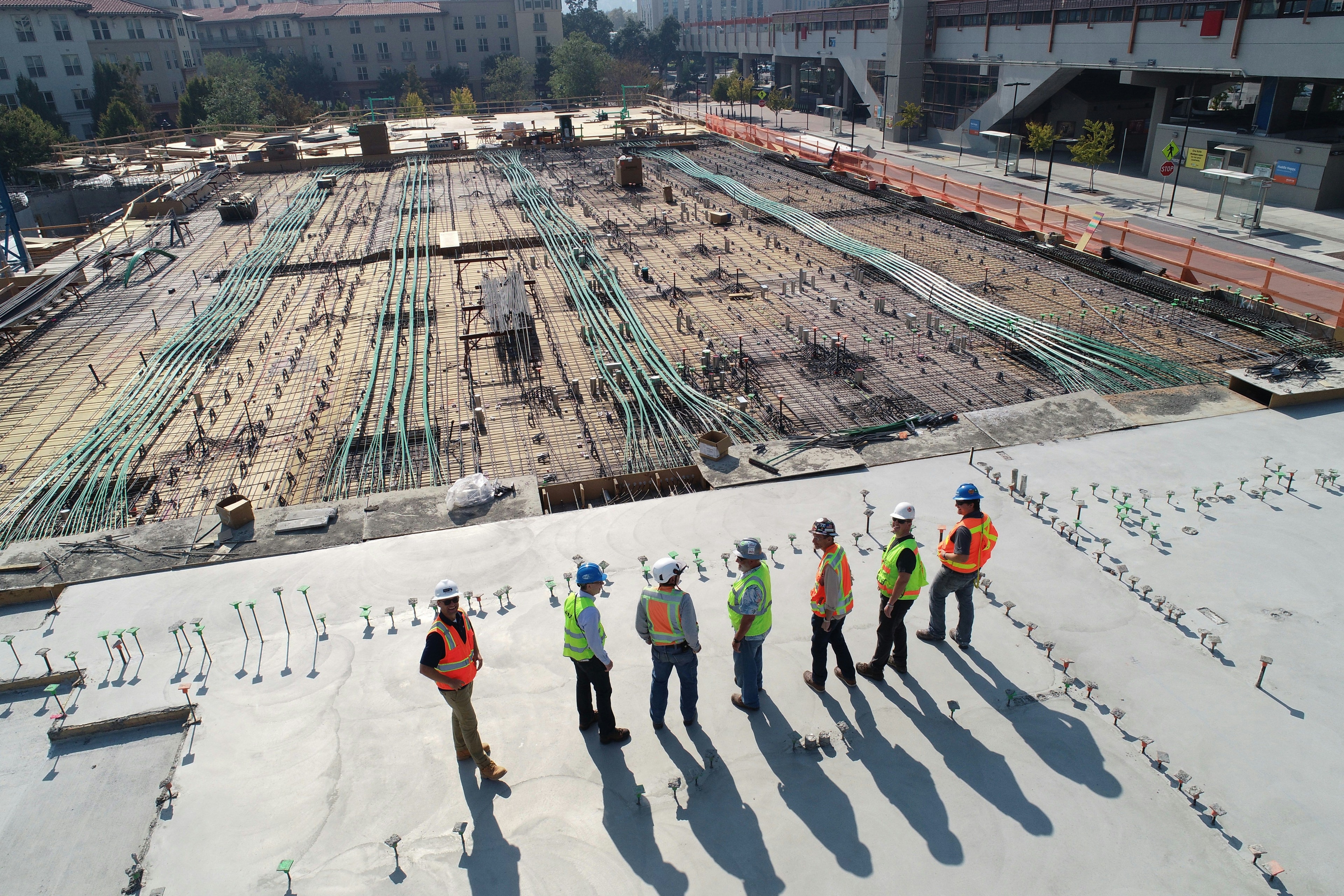 Large construction site overlooked by workers