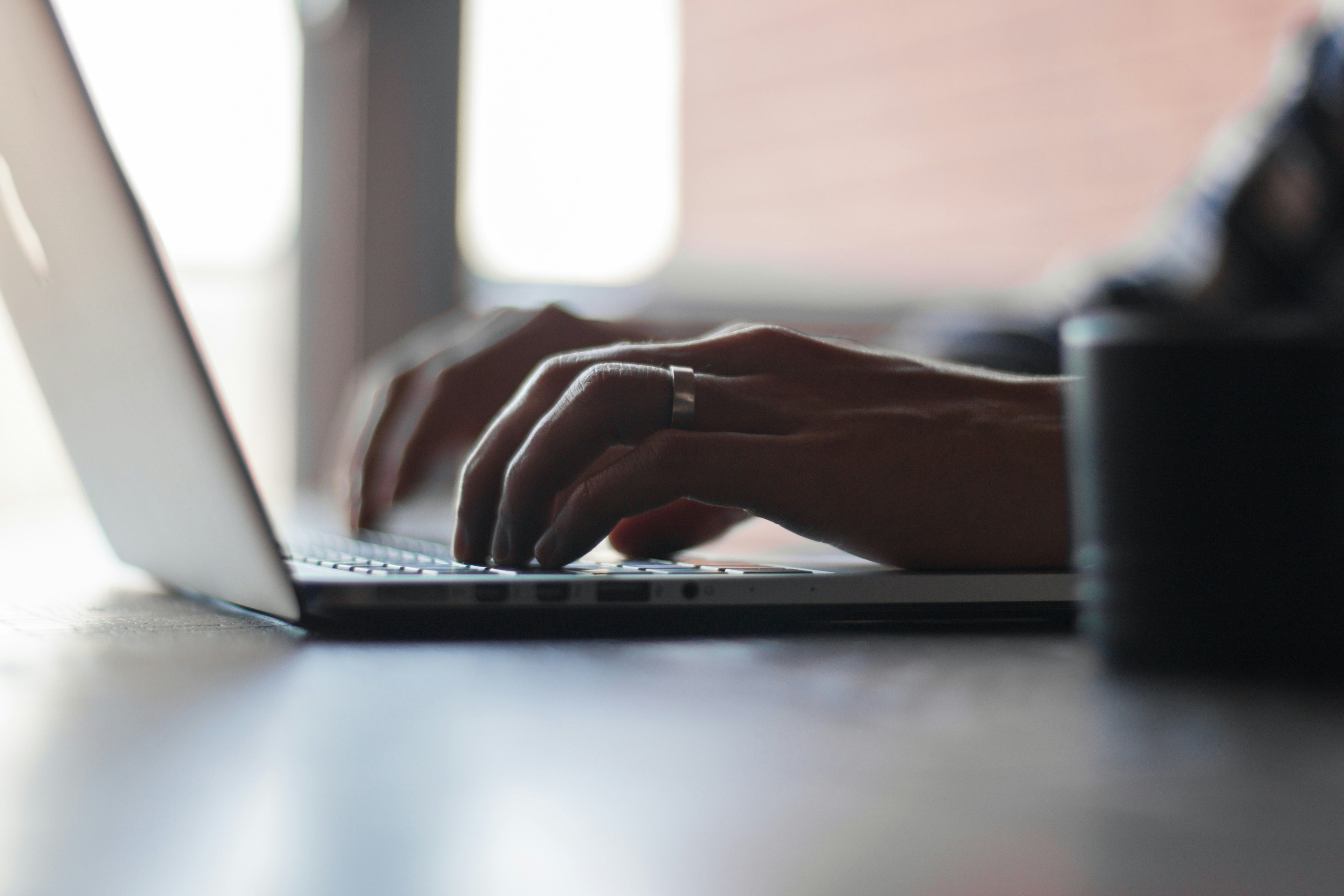 Typing on a laptop keyboard